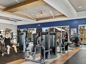 A group of people working out in a gym